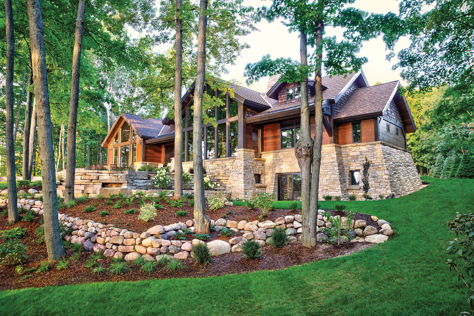 Lakeside custom home and terraced landscaping